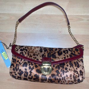 Leopard and red clutch